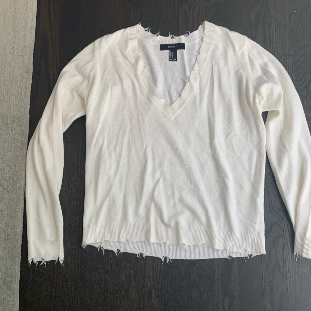 White distressed sweater
